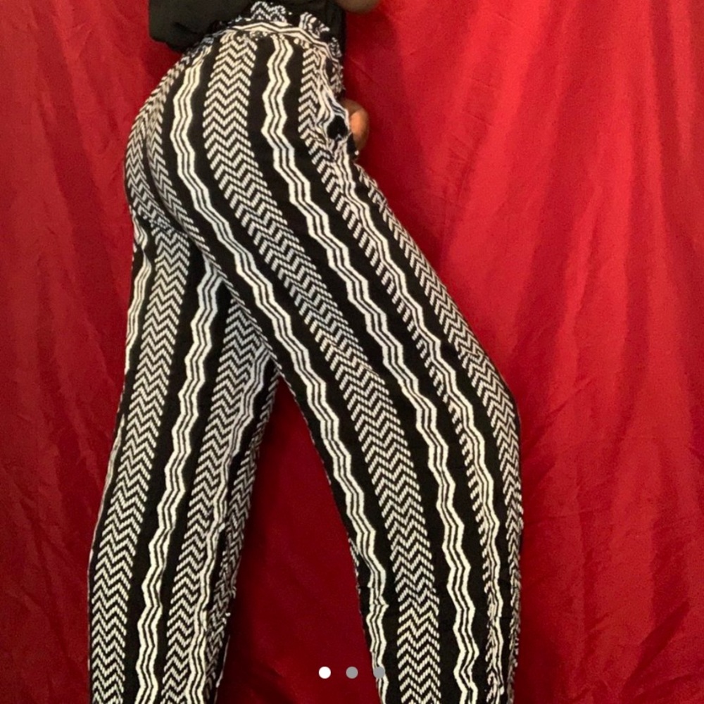Black and white belted pants.